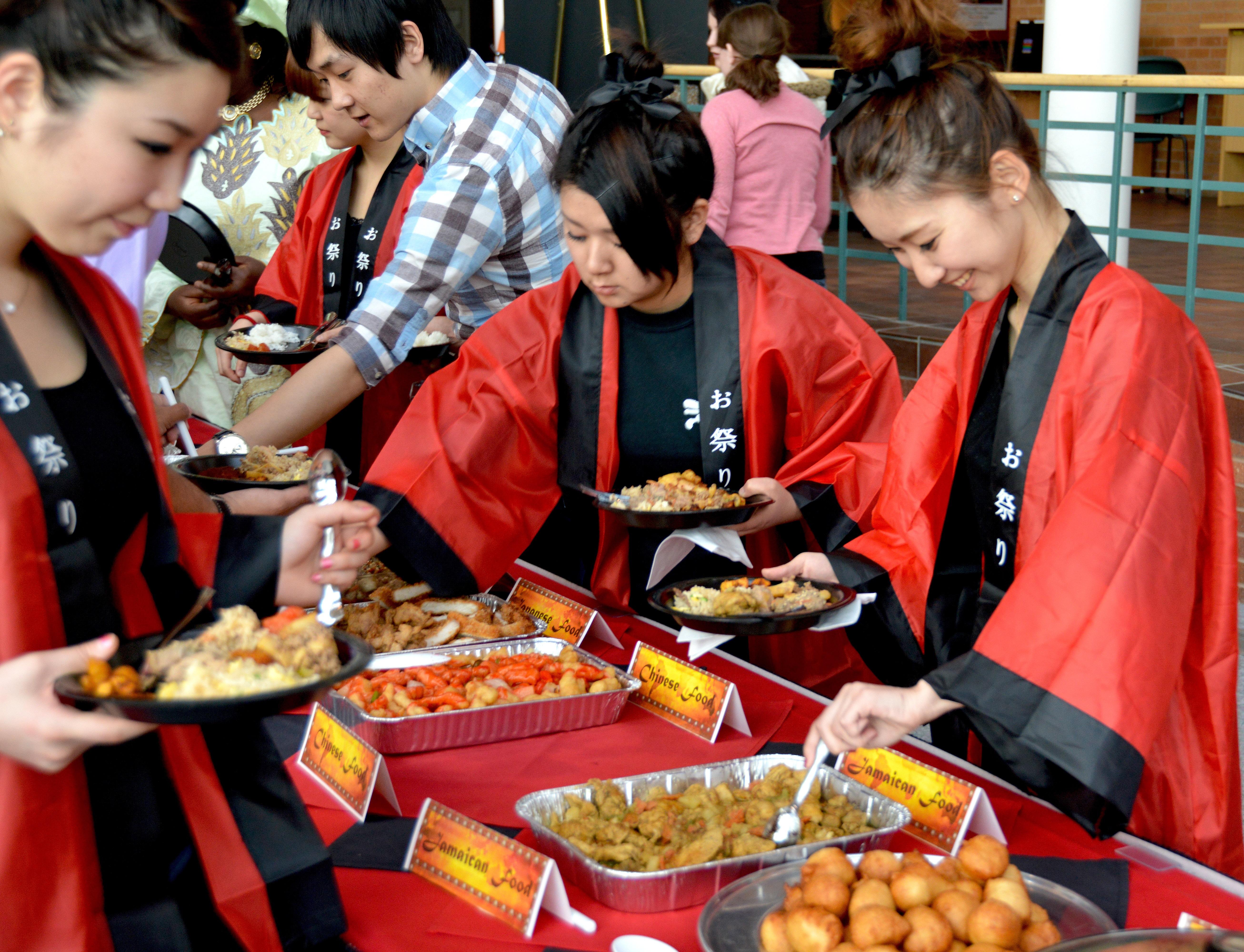 International students cook and serve their country favorite dishes. 