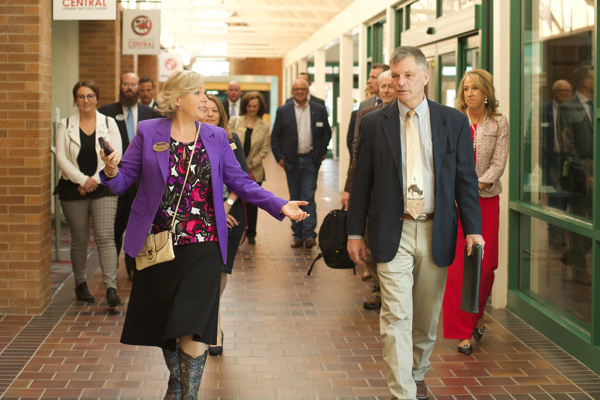 President Dr. Dale walking Governor Mark Gordon around campus