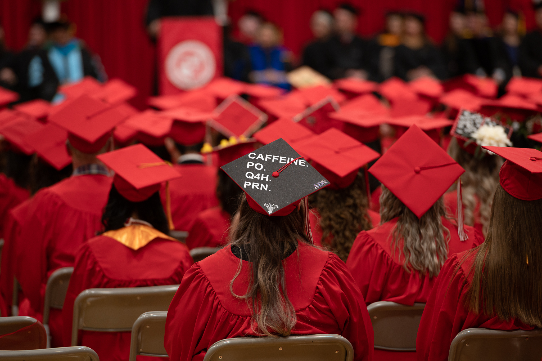 Students sitting during the graduation ceremony 