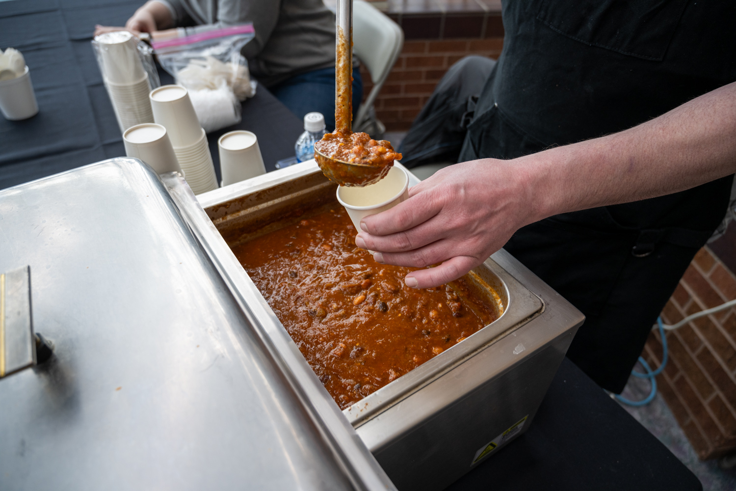 Red Chili Being Poured Into Cup