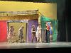 Actors on stage performing for the "Urinetown" production
