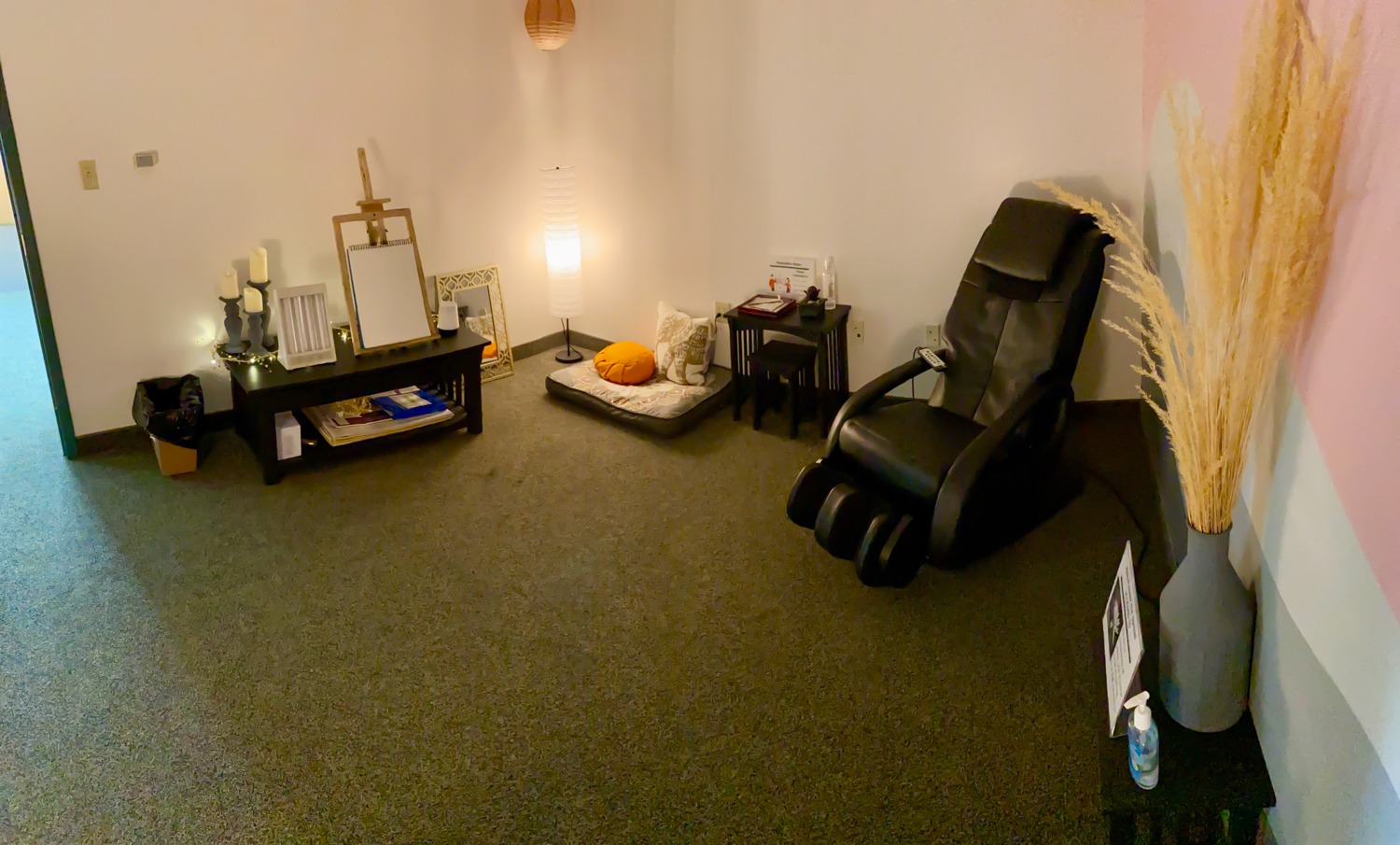 In image of the new relaxation room that has a massage chair. 
