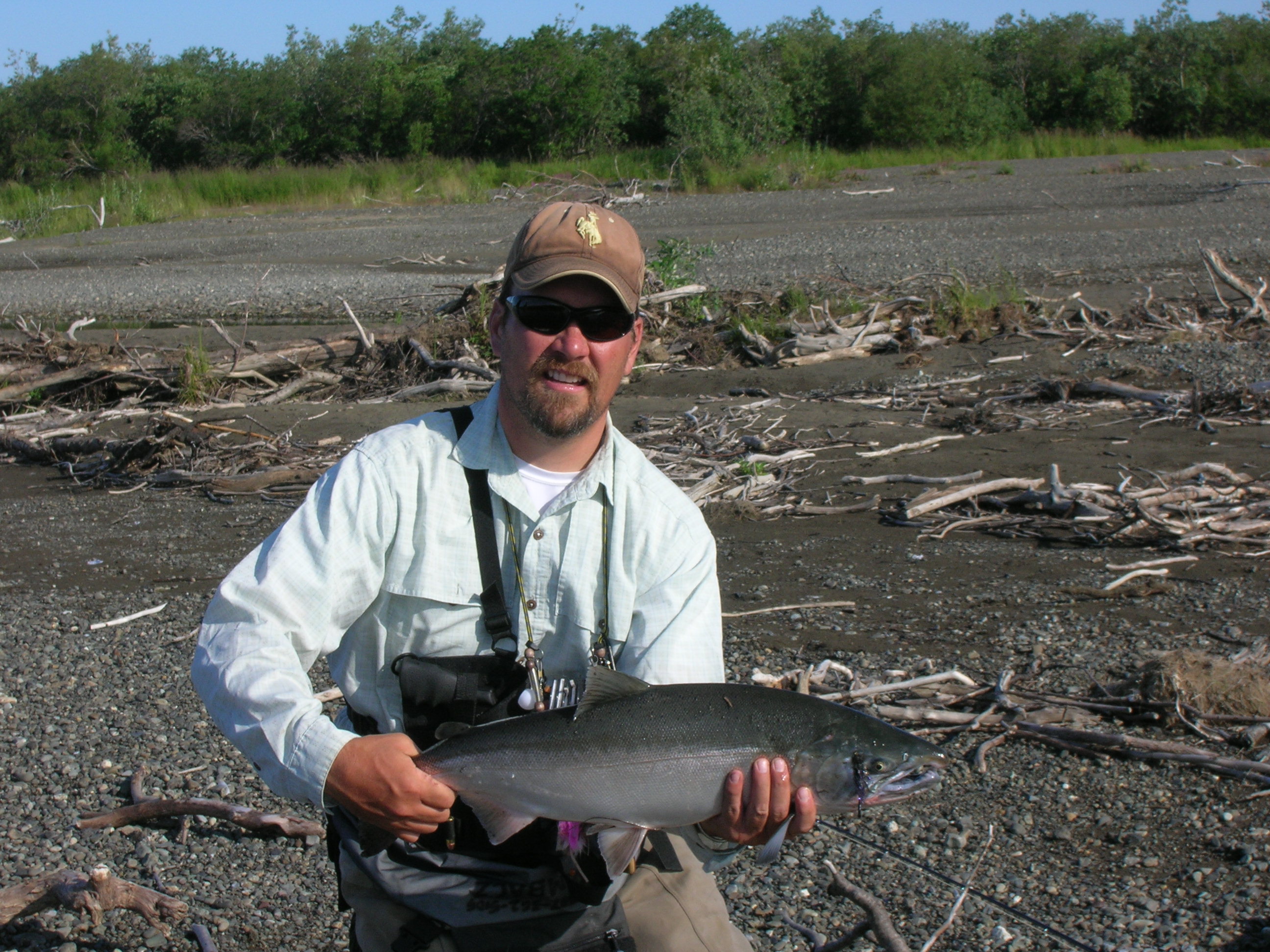 Instructor Mark Rembacz holding a large fish.